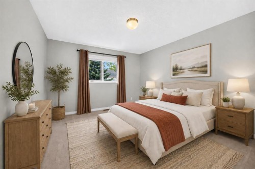 23 Sunlake Gardens Se, Calgary, AB - Indoor Photo Showing Bedroom
