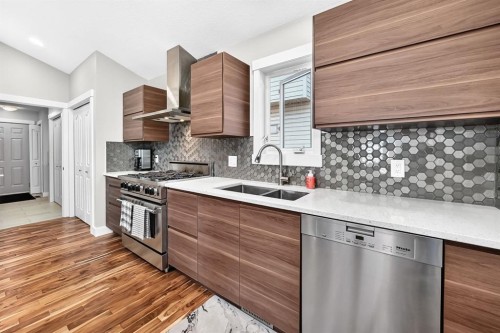 13 Cresthaven Way Sw, Calgary, AB - Indoor Photo Showing Kitchen With Double Sink