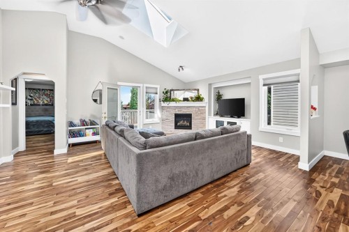 13 Cresthaven Way Sw, Calgary, AB - Indoor Photo Showing Living Room With Fireplace