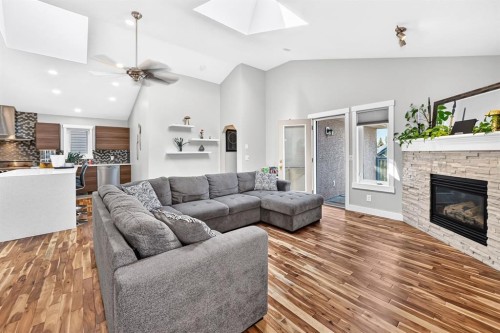 13 Cresthaven Way Sw, Calgary, AB - Indoor Photo Showing Living Room With Fireplace