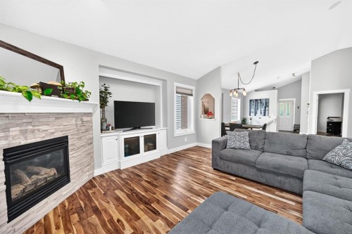 13 Cresthaven Way Sw, Calgary, AB - Indoor Photo Showing Living Room With Fireplace