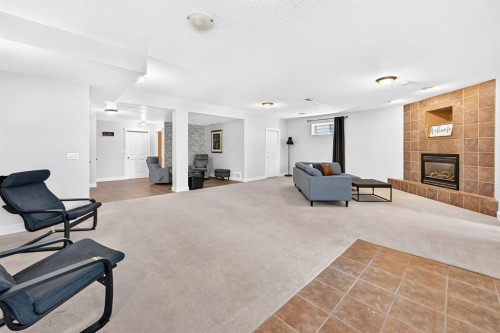 13 Cresthaven Way Sw, Calgary, AB - Indoor With Fireplace