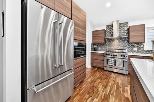 13 Cresthaven Way Sw, Calgary, AB - Indoor Photo Showing Kitchen With Stainless Steel Kitchen With Upgraded Kitchen