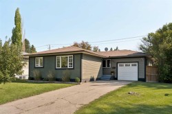 129 Springwood Drive SW Calgary, AB T2W 0K8