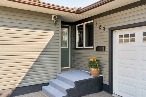 129 Springwood Drive Sw, Calgary, AB 