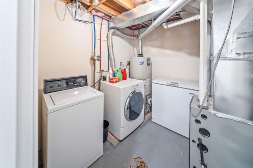 2819 28 Street Sw, Calgary, AB - Indoor Photo Showing Laundry Room