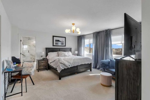 39 North Bridges Glen, Langdon, AB - Indoor Photo Showing Bedroom