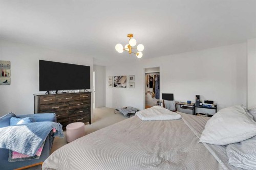 39 North Bridges Glen, Langdon, AB - Indoor Photo Showing Bedroom