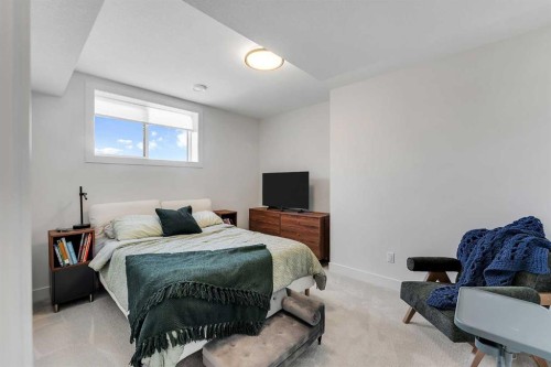 39 North Bridges Glen, Langdon, AB - Indoor Photo Showing Bedroom