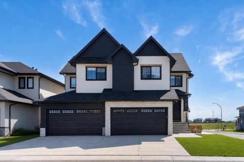39 North Bridges Glen, Langdon, AB - Outdoor With Facade