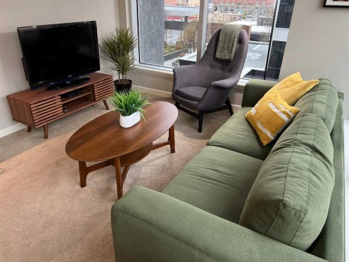 409-1320 1 Street Se, Calgary, AB - Indoor Photo Showing Living Room