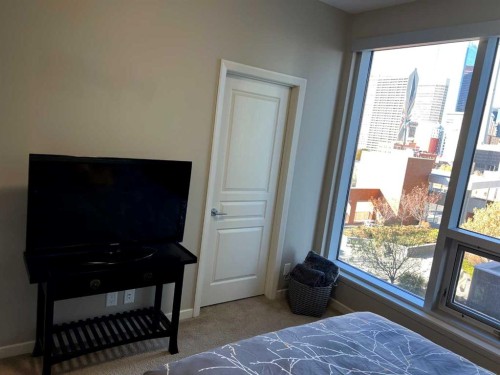 409-1320 1 Street Se, Calgary, AB - Indoor Photo Showing Bedroom