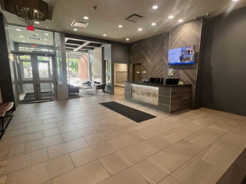 409-1320 1 Street Se, Calgary, AB - Indoor Photo Showing Other Room