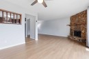 15 Doverville Way Se, Calgary, AB  - Indoor Photo Showing Other Room With Fireplace 