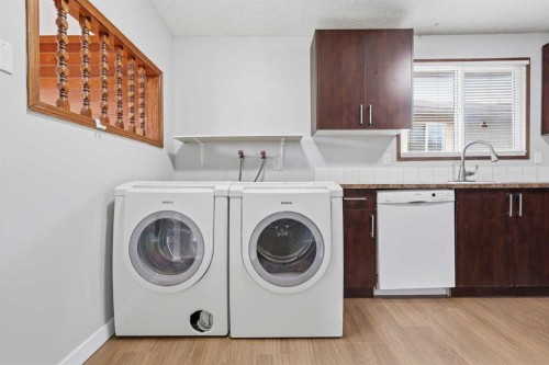 15 Doverville Way Se, Calgary, AB - Indoor Photo Showing Laundry Room