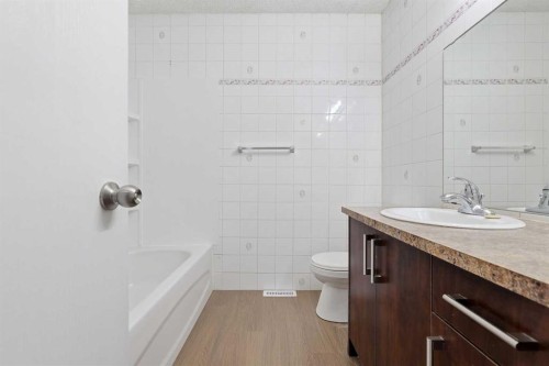 15 Doverville Way Se, Calgary, AB - Indoor Photo Showing Bathroom