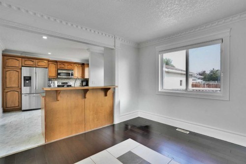 212 Pinetree Place Ne, Calgary, AB - Indoor Photo Showing Kitchen