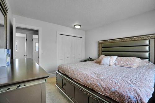 212 Pinetree Place Ne, Calgary, AB - Indoor Photo Showing Bedroom