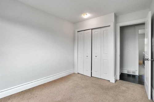 212 Pinetree Place Ne, Calgary, AB - Indoor Photo Showing Other Room