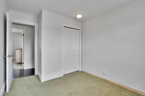 212 Pinetree Place Ne, Calgary, AB - Indoor Photo Showing Other Room