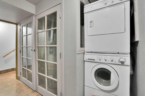 212 Pinetree Place Ne, Calgary, AB - Indoor Photo Showing Laundry Room