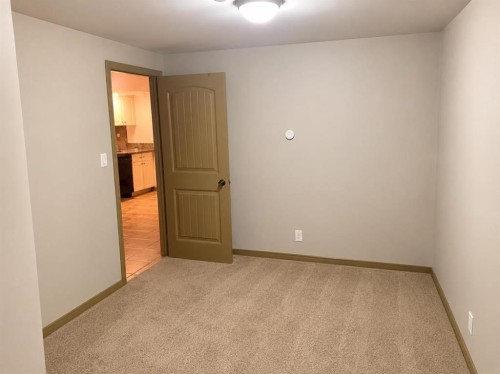 212 Pinetree Place Ne, Calgary, AB - Indoor Photo Showing Other Room