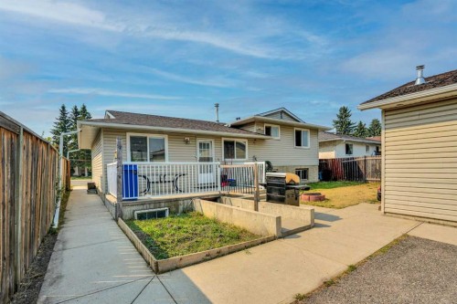 212 Pinetree Place Ne, Calgary, AB - Outdoor With Deck Patio Veranda With Exterior