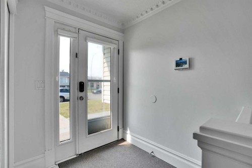 212 Pinetree Place Ne, Calgary, AB - Indoor Photo Showing Other Room
