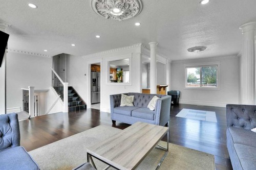212 Pinetree Place Ne, Calgary, AB - Indoor Photo Showing Living Room
