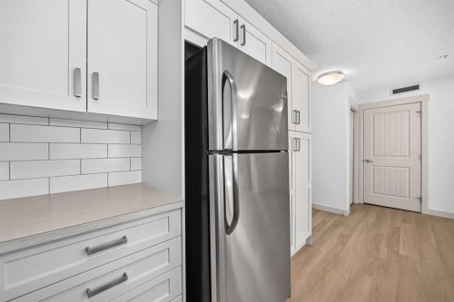 2105-450 Sage Valley Drive Nw, Calgary, AB - Indoor Photo Showing Kitchen