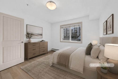 2105-450 Sage Valley Drive Nw, Calgary, AB - Indoor Photo Showing Bedroom