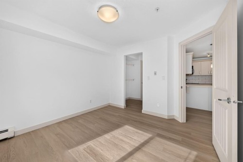 2105-450 Sage Valley Drive Nw, Calgary, AB - Indoor Photo Showing Other Room