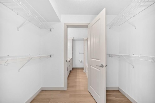 2105-450 Sage Valley Drive Nw, Calgary, AB - Indoor With Storage