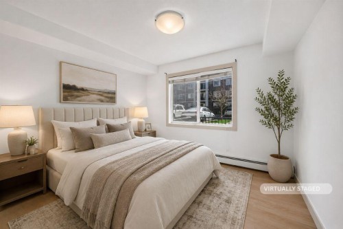 2105-450 Sage Valley Drive Nw, Calgary, AB - Indoor Photo Showing Bedroom