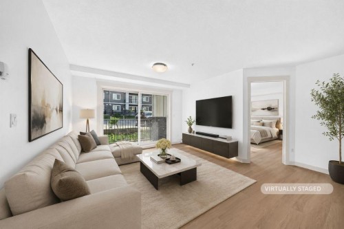 2105-450 Sage Valley Drive Nw, Calgary, AB - Indoor Photo Showing Living Room