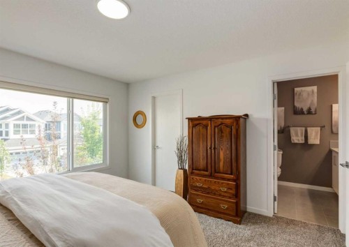 71 Seton Gardens Se, Calgary, AB - Indoor Photo Showing Bedroom