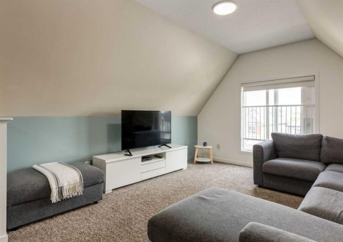 71 Seton Gardens Se, Calgary, AB - Indoor Photo Showing Living Room