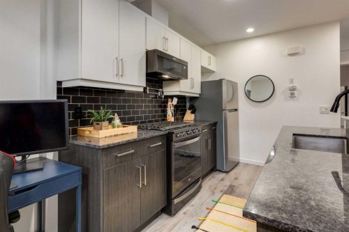 71 Seton Gardens Se, Calgary, AB - Indoor Photo Showing Kitchen