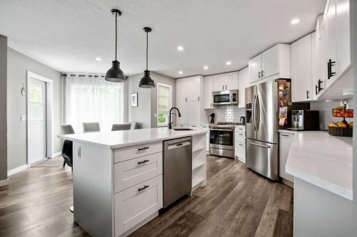 141 Somerset Circle Sw, Calgary, AB - Indoor Photo Showing Kitchen With Stainless Steel Kitchen With Upgraded Kitchen
