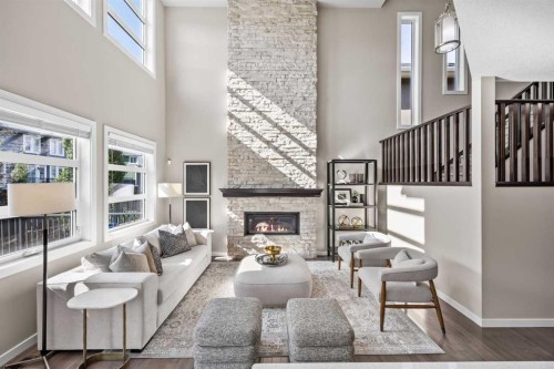 29 Aspen Summit Point Sw, Calgary, AB - Indoor Photo Showing Living Room With Fireplace