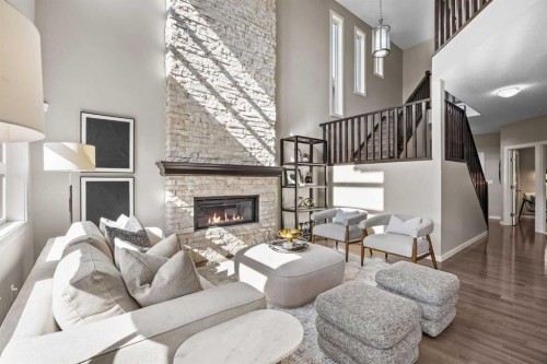 29 Aspen Summit Point Sw, Calgary, AB - Indoor Photo Showing Living Room With Fireplace