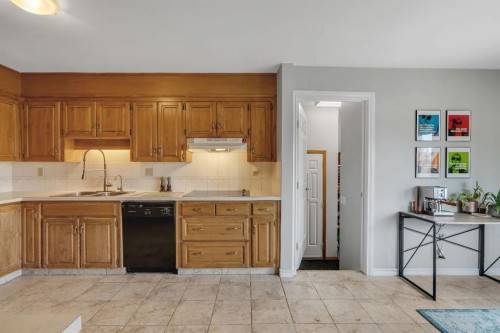 254 Hendon Drive Nw, Calgary, AB - Indoor Photo Showing Kitchen With Double Sink