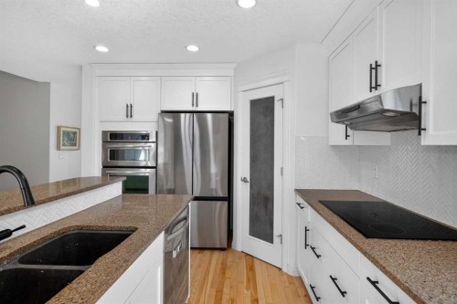 79 Autumn Green Se, Calgary, AB - Indoor Photo Showing Kitchen With Stainless Steel Kitchen With Double Sink With Upgraded Kitchen