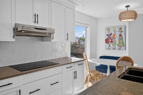 79 Autumn Green Se, Calgary, AB - Indoor Photo Showing Kitchen With Double Sink