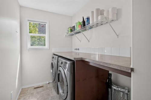 79 Autumn Green Se, Calgary, AB - Indoor Photo Showing Laundry Room