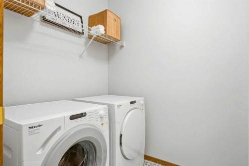 50 Douglasview Park Se, Calgary, AB - Indoor Photo Showing Laundry Room