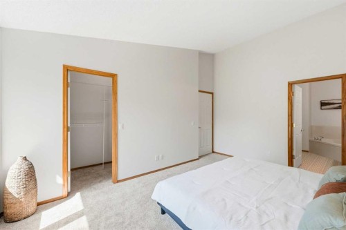 50 Douglasview Park Se, Calgary, AB - Indoor Photo Showing Bedroom