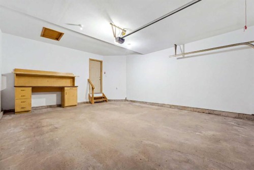 50 Douglasview Park Se, Calgary, AB - Indoor Photo Showing Garage