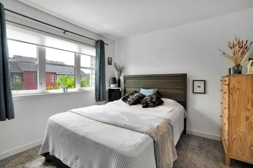 984 Walden Drive Se, Calgary, AB - Indoor Photo Showing Bedroom