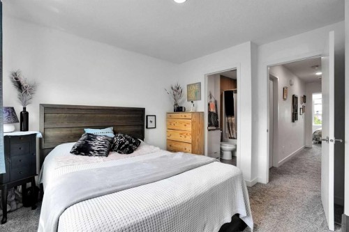 984 Walden Drive Se, Calgary, AB - Indoor Photo Showing Bedroom
